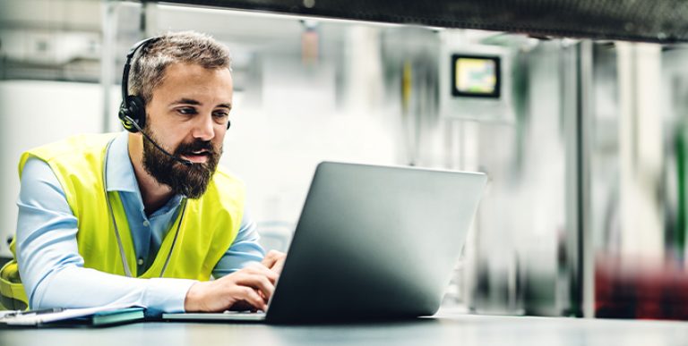 Employee taking an online safety training through Safety OnDemand from ICW Group