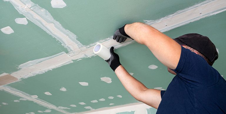 man-hanging-drywall-blog