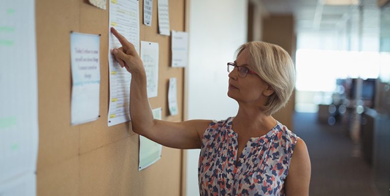 reading-OSHA-form-on-notice-board-v1-blog