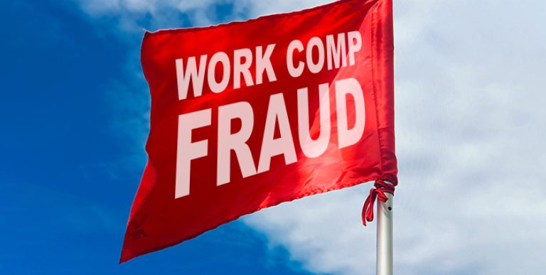 Red warning flag at the beach with blue sky background