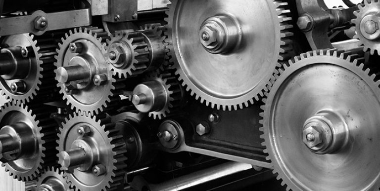A closeup of gears in a machine.