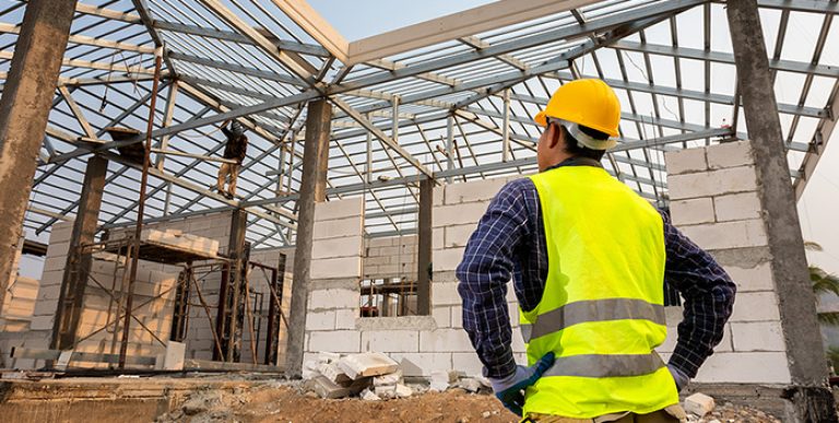 An inspector viewing a construction site.